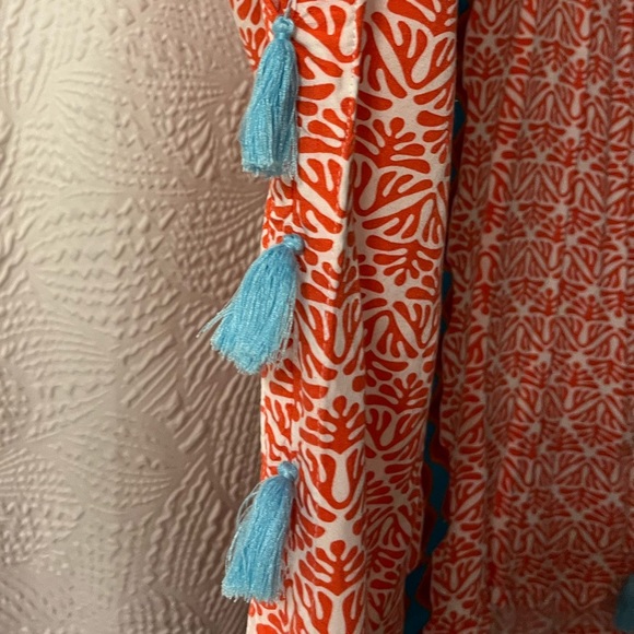 Beautiful and Vibrant V Neck Blouse with Tassles - Picture 4 of 9